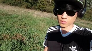Jon Arteen pulls out his beautiful penis and urinates outdoors. Asian gay pornography featuring an effeminate young man.