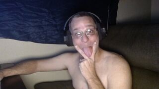 DubeSnackes sitting at his computer watching some porn on the computer. so come watch him play with his fat juicy cock.