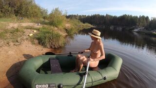 Nude girl in boat and walk in the swamp