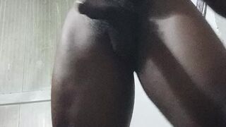 Macho black muscular guy masturbating after a long day at work