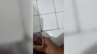 MALE MASTURBATION IN BATHROOM WHILE WATHING PORN